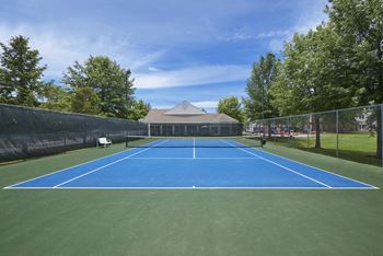 Hampshire green apartments - lighted tennis court